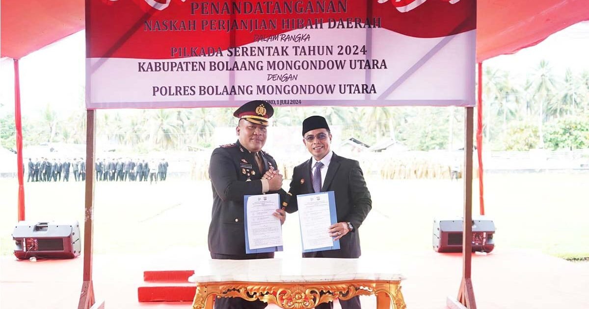Pj Bupati Bolmut Hadiri Upacara dan Teken Perjanjian Hibah